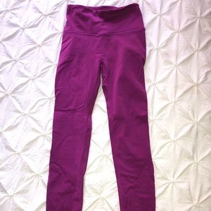 Purple lululemon leggings with mesh bottoms